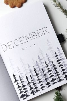 a christmas card with pine trees and the words december written in black ink on it