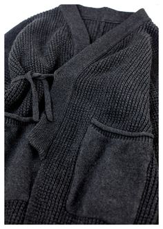 Black V-neck Cozy Sweater Coat, Black Cotton Winter Sweater Coat, Black Cotton Sweater Coat For Winter, Cozy Black V-neck Outerwear, Black Knitted Sweater For Loungewear, Black Soft Knit Sweater For Loungewear, Long Black Knit Outerwear, Black Knitted Cotton Outerwear, Black Sweater Coat With Pockets For Cold Weather