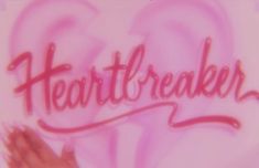 the word heartbreakerer written in pink ink