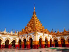 an ornate building with gold and red trim