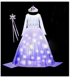 a white dress with blue lights and a tiara