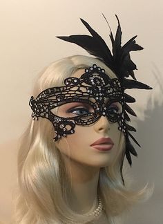 "Black Lace Masquerade Mask with Feathers and Crystals, Women's Lace Mask, Masked Ball, Wedding Masquerade Masks, Bridal Wedding Mask Beware of cheap imitations that use glue! This is an original design by IceGreenEyes. Stiffened and lace mask will not sweat your face like the cheap plastic ones. The mask is also shaped so you have lots of room around the eyes instead of a skinny slice. These masks are hand stitched, not held together with sticky glue that will heat up and fall apart before the Black Masquerade Mask For Halloween Wedding, Black Masquerade Mask For Wedding Carnival, Black Wedding Headpiece For Carnival, Fitted Embellished Bridal Accessories For Party, Wedding Masquerade Mask With Rhinestones, Elegant Fitted Masquerade Mask For Costume Party, Adjustable Masquerade Mask For Wedding Carnival, Masquerade Carnival Headpiece, Elegant Masquerade Mask For Party