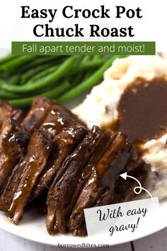 an easy crock pot roast recipe on a plate with mashed potatoes and green beans