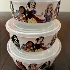 three disney princess bowls stacked on top of each other