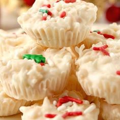 small cupcakes with white frosting and sprinkles