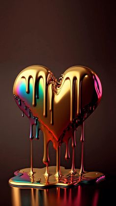 a heart shaped object with dripping paint on it