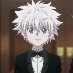 an anime character with white hair and blue eyes wearing a tuxedo in front of a door