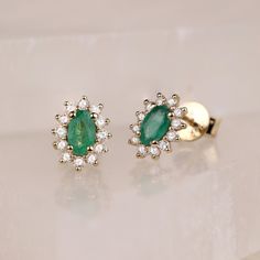 "Natural Emerald and Diamond Earrings / 14k Solid Gold / Emerald Earrings / Gold Stud Earrings / Make a Set with Necklace and Ring / Genuine ✔ Handmade ✔ Diamond Ct Weight: 0.24ctw ✔ Emerald Ct Weight: 0.46 All our emeralds are treated natural emeralds (Emeralds are typically treated with oil or other \"fillers\" to draw the filling substance into any surface-reaching fissures to improve the clarity of the emerald) ✔ Setting Dimension: 7mmx9mm ✔ Solid Gold ✔ Natural Diamonds and Natural Emerald Emerald Earrings Gold, Gold Emerald Earrings, Small Gold Necklace, Emerald And Diamond Earrings, Emerald Stud Earrings, Emerald Earrings Studs, Solid Gold Necklace, Stud Set, Emerald Earrings