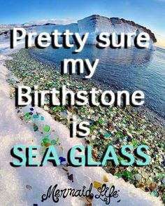 a beach covered in sea glass with the words pretty sure my birth stone is seaglass