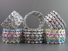 several bracelets are stacked on top of each other