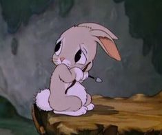 a cartoon rabbit sitting on top of a tree stump