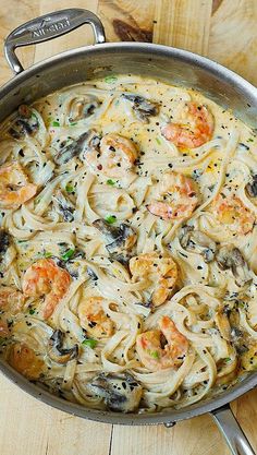 pasta with shrimp and mushrooms in white sauce