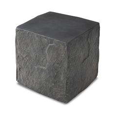 Cast black concrete features heavily textured sides that resemble natural slate, paired with a smoothed tabletop. | Four Hands Lucius End Table in Black | Mathis Home Black Stone Table, Marble Top End Tables, Copper Top Table, Black Concrete, Concrete Materials, Stone Table, Slate Stone, Organic Decor, Outdoor Ottomans