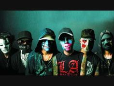 five men with face paint on their faces