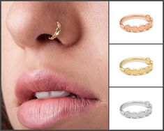 three different types of nose piercings and one is gold, silver, or rose