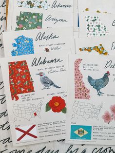 several postcards with different types of birds and flowers on them are laid out together