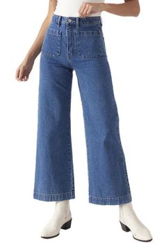 Fall for the silhouette of these high-waist jeans made from stretch-kissed denim in a light-blue wash with retro patch pockets and wide ankle-grazing hems. 28" inseam; 23" leg opening; 12 1/2" front rise; 14 1/2" back rise (size 29) Zip fly with button closure Five-pocket style 99% cotton, 1% elastane Machine wash, line dry Imported Sailor Jeans, Retro Patch, Sailor Jean, Vintage Denim, Sweater Jacket, Bottoms Pants, High Waist Jeans, Vintage Looks, The Ordinary