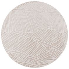 a white round rug with lines drawn on it