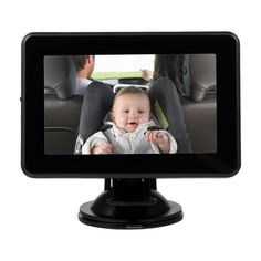 a baby in a car seat is shown on the screen