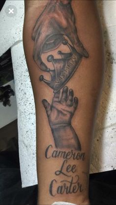 a person with a tattoo on their arm holding up a trophy and the words champion lee carter