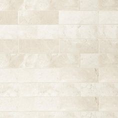 an image of a white tile wall that looks like it is made out of marble