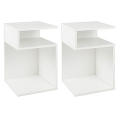 two white shelves sitting next to each other