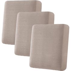 three pieces of beige fabric sitting next to each other