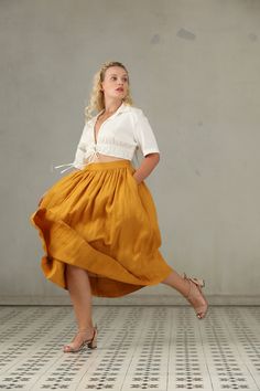 "Party, business, school, where will you want to wear this skirt? Clean,crisp and polished: YELLOW Skirt is a timeless wardrobe staple. This is a plus size version of our Daisy skirt. Be a goddess in our curvy line. For far too long, plus-size dresses have been synonymous with baggy, shapeless, and style-less outfits. But goddess like plus-size dresses do exist. Usually, as the size increases, fashion industry often just use more fabrics. Unfortunately, it is difficult to balance the amount of f Yellow Pleated Skirt With Relaxed Fit For Summer, Fitted Flared Linen Skirt, Yellow Full Maxi Skirt For Spring, Fitted Linen Flared Skirt, Vintage Linen Skirt For Spring, Fitted Linen Full Skirt, Mustard Lined Skirt For Spring, Yellow Flowy Skirt, Yellow Relaxed Fit Pleated Summer Skirt