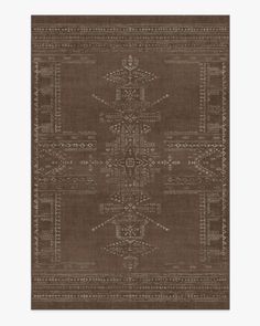 a brown rug with an intricate design on it