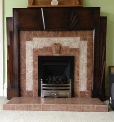 a fireplace with a clock above it in a living room