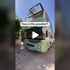 a green double decker bus parked in front of a building with the words how is this possible?