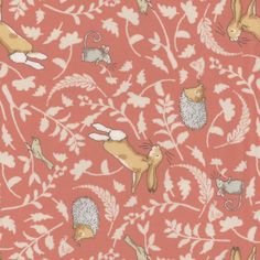 an orange and white wallpaper with rabbits, flowers and leaves on it's surface