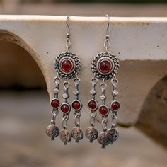 "Experience the timeless style of our Medieval Pomegranate Silver Dangle Earrings. These stunning earrings feature red stone accents and delicate filigree details, inspired by Celtic, Viking, and Armenian jewelry designs. Made with high-quality silver, these dangle earrings add a touch of elegance and history to any outfit. Perfect for both men and women, they make a great addition to any jewelry collection." Medieval Pomegranate, Medieval Earrings, Armenian Jewelry, Celtic Viking, Viking Shield, Silver Dangle Earrings, Earrings Red, Stunning Earrings, Red Stone