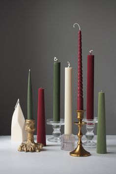 a group of candles sitting next to each other