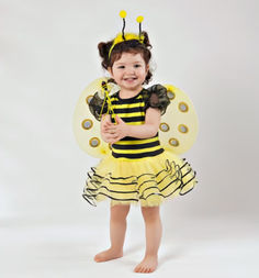 Brighten up any event with this adorable 4-piece Bee Costume for girls! This set includes a striped dress, wings, a bee stick, and a cute hairband with antennae, perfect for Halloween, themed birthday parties, or fun dress-up play. Made with comfortable, high-quality materials, this costume ensures your little one will buzz with joy all day long. The vibrant yellow and black design will make your child stand out, capturing everyone’s attention at any event! Baby Bumble Bee Costume, Bee Fancy Dress, Bee Antenna, Bee Costumes, Honey Bee Birthday, Bumblebee Costume, Baby Bumble Bee, Bumble Bee Costume, Princess Fancy Dress