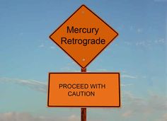 there are two road signs on top of each other that read, mercuy retrograde proceed with caution