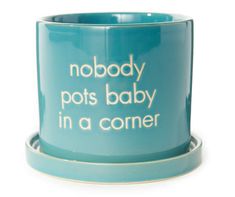 a blue coffee mug with the words nobody pots baby in a corner