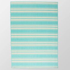 a blue and white striped rug