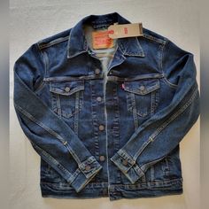 Levi's Blue Regular Fit Stretch Denim Trucker Jacket Men's Sz Small. New Reasonable Offers Are Welcomed Thru The Offer Button. New To Posh?? Sign Up With My Code Sturge40 And Get $10. Levis Trucker Jacket Men, Levis Trucker Jacket, Trucker Jacket Men, Concept Clothing, Denim Trucker Jacket, Levis Jacket, Mens Style, Trucker Jacket, Levis Men