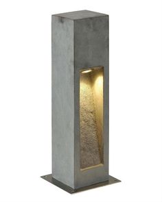 an outdoor light that is made out of concrete