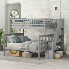 a bedroom with a bunk bed and stairs in the corner, next to a chair