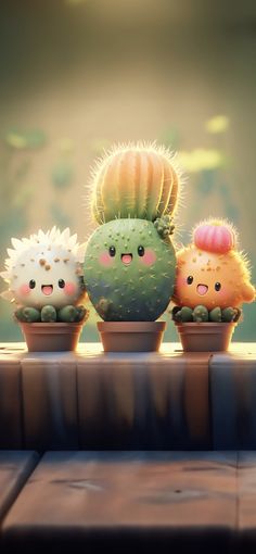 three little cactuses are sitting in small pots