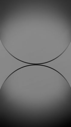 an abstract black and white photo with curves