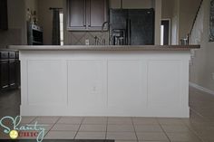 the kitchen is clean and ready to be used as a living room or family room