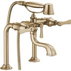 a faucet that is attached to the side of a wall mounted faucet