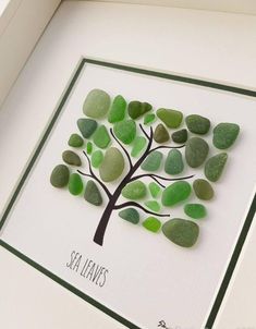 a card with sea glass in the shape of a tree