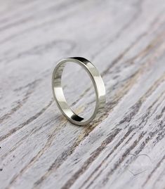 This classic shiny silver ring features a minimalist design that's ideal for everyday wear and a versatile stylish accessory for any occasion! Engagement Rings Simple Men, Flat Silver Ring, Silver Ring Bands For Women, Simple Silver Band Ring, Sterling Silver Rings Men, Simple Ring Men, Simple Ring For Men, Simple Ring Design For Men, Silver Rings Men Design