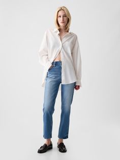 Fit: Hugs your hips, holds you in & ends with a straight leg that hits at the ankle.  Fabric: 94% Cotton, 5% Recycled Materials, 1% Stretch.  Stretch: Low Stretch Jeans.  Feels like vintage denim with a hint of stretch.  Snug at first & holds you in, but forms to your shape. ​ Rise: High Rise Jeans.  Look: A classic five-pocket jean in a light indigo wash with fading.  Details: Hidden button fly & five-pocket styling.  Responsibly Made: This pair of jeans is part of our water-saving Washwell pro Gap Light Wash Relaxed Fit Jeans, Gap Relaxed Fit Denim Jeans, Light Indigo Relaxed Fit Straight Leg Jeans, Gap Mid-rise Relaxed Fit Jeans, Best Jeans For Short Women, Gap High-rise Relaxed Fit Jeans, Gap Jeans Women, Flattering Jeans, Jeans Look