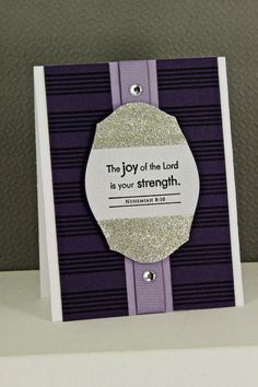 a purple and white card with the words, the joy of the lord is your strength