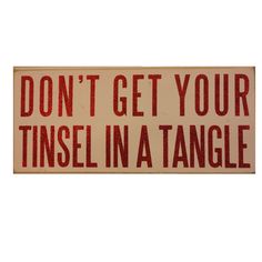 a red and white sign that says don't get your tinsel in a tangle